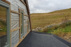 Hertalan-being-fitted-on-a-curved-roof